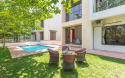 StayVista's Greenwoods Villa 8 - City-Center Villa with Private Pool, Terrace, Lift & Ping-Pong Tabl