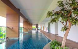 Studio Room @ Capitol Suites Apartment By Travelio