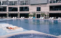 SIGLO SUITES @ The Knightsbridge Residences