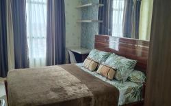 Just Cozy Apartment (1 BR borneo bay city)
