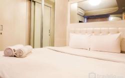 Posh 2BR Apartment at Bassura City By Travelio