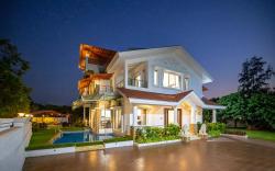 Casa Serenity by StayVista - Relax with a pool, lawn, and inviting jacuzzi