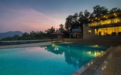 StayVista's Lake Mansion - Lakeside Villa with Mountain View, Large Pool & Sprawling Lawn