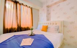 Relaxing 2BR Bassura City Apartment By Travelio