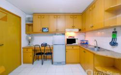 New Furnished 1BR Rajawali Apartment By Travelio