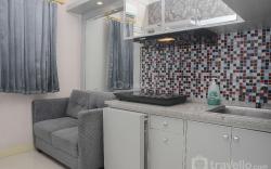 Clean 2BR Green Pramuka Apartment By Travelio