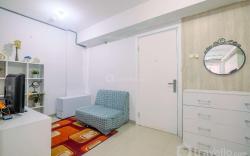 Furnished Green Pramuka 1BR Apartment By Travelio