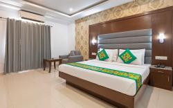 Treebo Grand Legacy Elite With Roof Top Cafe