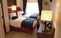 Simply Rooms & Suites Hotel
