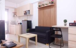 Cozy 2BR Baywalk Green Bay Apartment By Travelio