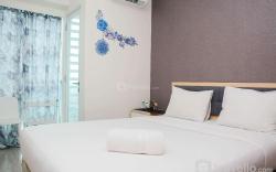 Cozy Stay 1BR at Grand Kamala Lagoon Apartment By Travelio