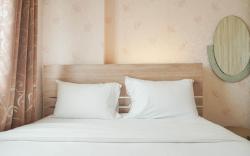 Comfort 2BR Green Pramuka City Apartment near Shopping Center By Travelio