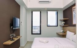 Comfy Studio at Evenciio Apartment By Travelio