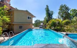 StayVista's Chimney Cottage with Sprawling Lawns