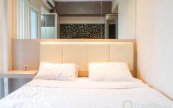 Warm Studio Apt at Tamansari Papilio By Travelio