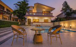 StayVista's Brookvale Cottage - Dive into tranquility with pool view and gazebo