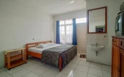 Pall Inn Puncak Mitra RedDoorz