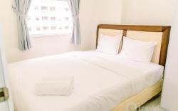 Modern 2BR Green Pramuka City nearMall By Travelio