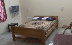 suloram illam    three  rooms each with 2,4,5 beds