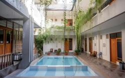 Urbanview Hotel Blok O International by RedDoorz