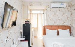 Homey Studio at Green Palm Residence By Travelio