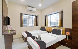 Capital O Hotel Dak Plaza
