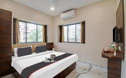 Capital O Hotel Dak Plaza