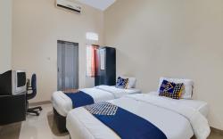 SPOT ON 91772 Nisrina Homestay Syariah