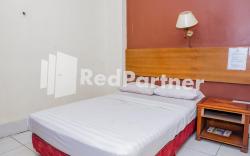 Hotel Sebelas @ Jalan Palasari Mitra RedDoorz