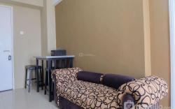 Strategic 1BR Bassura City Apartment By Travelio