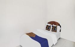 SPOT ON 91858 Raja Homestay Syariah