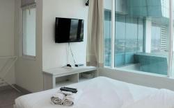 Warm Cozy Studio Grand Kamala Lagoon By Travelio