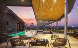 StayVista's Le Ciel - Lakeside Retreat Amidst Farmland with Pool, Indoor Activities, Lawn, Bonfire P