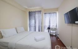 Homey and Cozy Living Studio Tifolia By Travelio