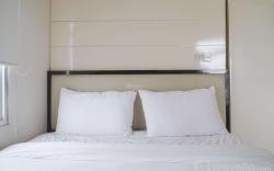 Large 2BR Green Bay Pluit Sea View By Travelio