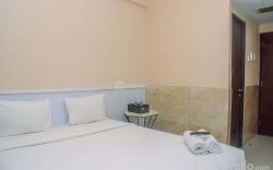 Minimalist Studio at Grand Dhika City By Travelio