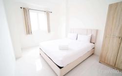 Best Tidy 2BR at Puncak Dharmahusada By Travelio