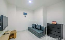 Homey 2BR at Sentul Tower Apartment By Travelio