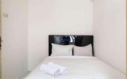 Cozy 2BR at Delta Cakung Apartment By Travelio