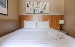 Homey Living 2BR Parahyangan Residence By Travelio