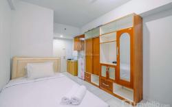 Homey and Tidy Studio Dramaga Tower By Travelio
