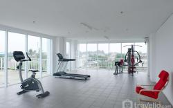 Minimalist Studio at Poris 88 Apt By Travelio