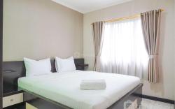 Cozy and Simply Look 2BR Puri Garden By Travelio