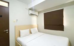 Basic 2BR at Lagoon Apartment By Travelio