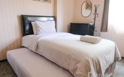 Homey and Cozy Studio at Suites Metro By Travelio