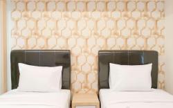 Tranquil Studio at De Prima Apt By Travelio