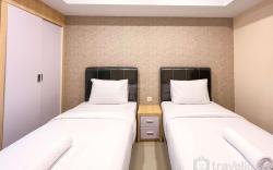 Comfy Studio at De Prima Apartment By Travelio