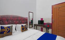 SPOT ON 92570 Putri Guest House Syariah Near SPBU Rimbo Panjang