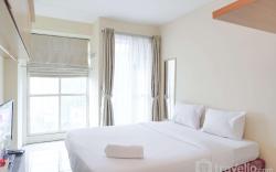 Homey Cozy Studio Tifolia Apartment By Travelio