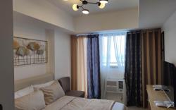 Skycourt Suites at Azure North Condo 2